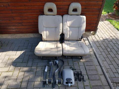 Opel Vectra galinės sėdynės atidengimas, atskleidžiantis kuro siurblio prieigos dangtelį