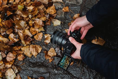 Fotografas, naudojantis trikojį ir ND filtrą ilgos ekspozicijos fotografijai.
